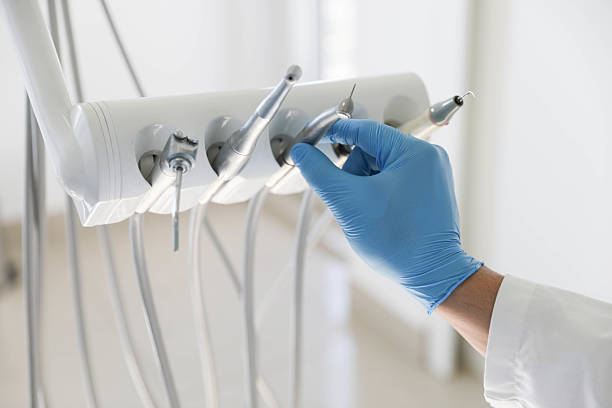 Professional Tooth Extraction technician working in Huntington Beach, CA